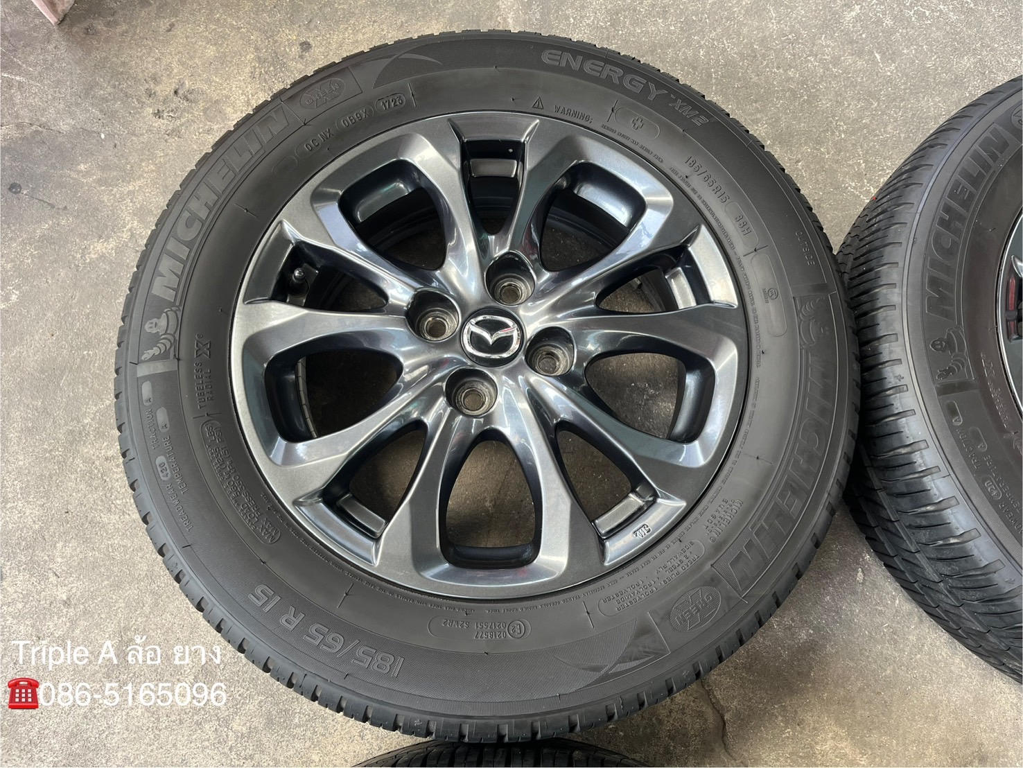 ✨ล้อแม็ก✨Mazda 2 Skyactiv ขอบ 15 สีเทาดำ พร้อมยาง 185-65-15 Michelin🌟ปี 23🌟