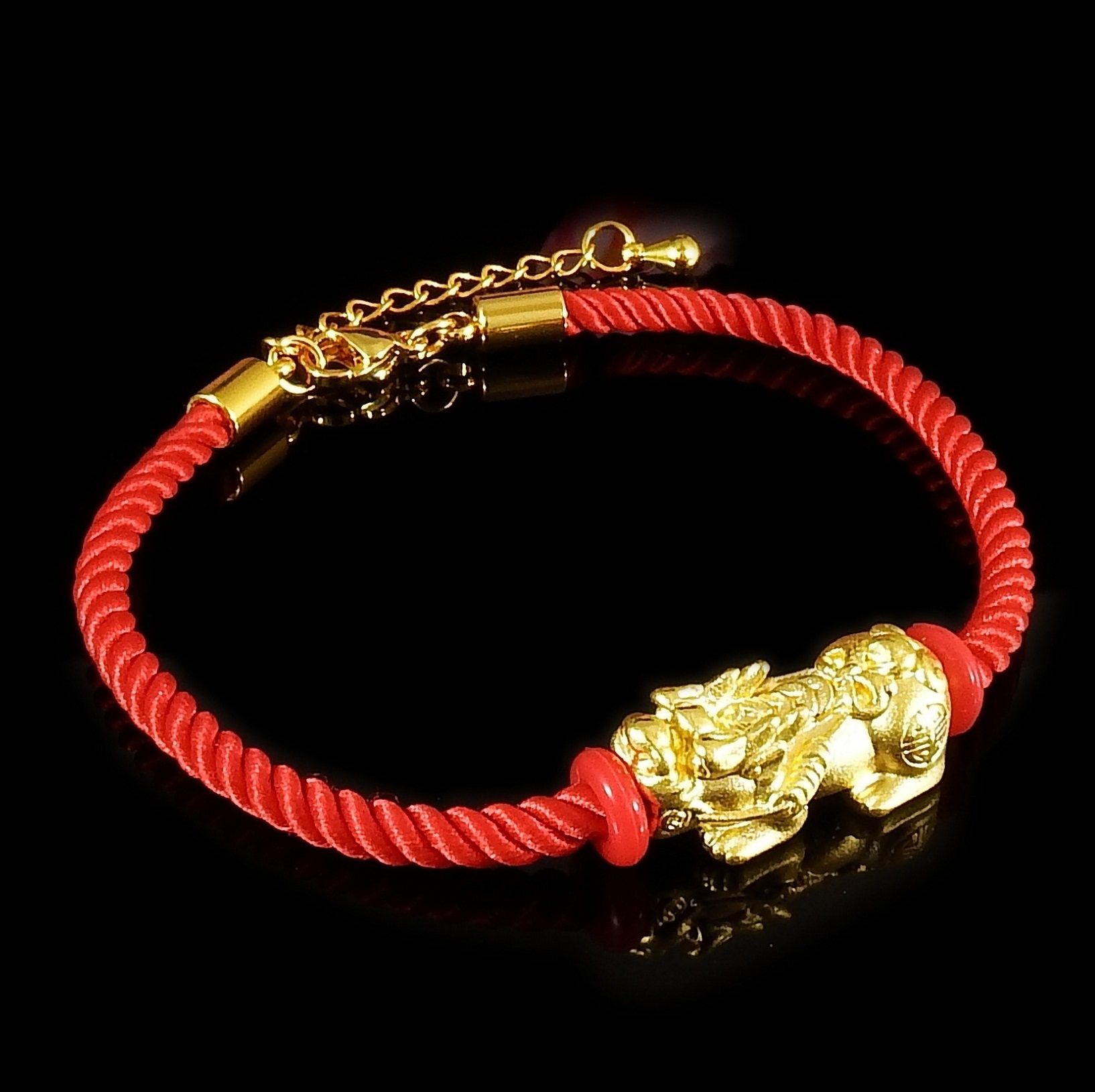 สร้อยข้อมือปี่เซี๊ยะทองคำแท้ 99.99% เชือกเกาหลีสีแดงปรับสายได้ 15-18 cm.