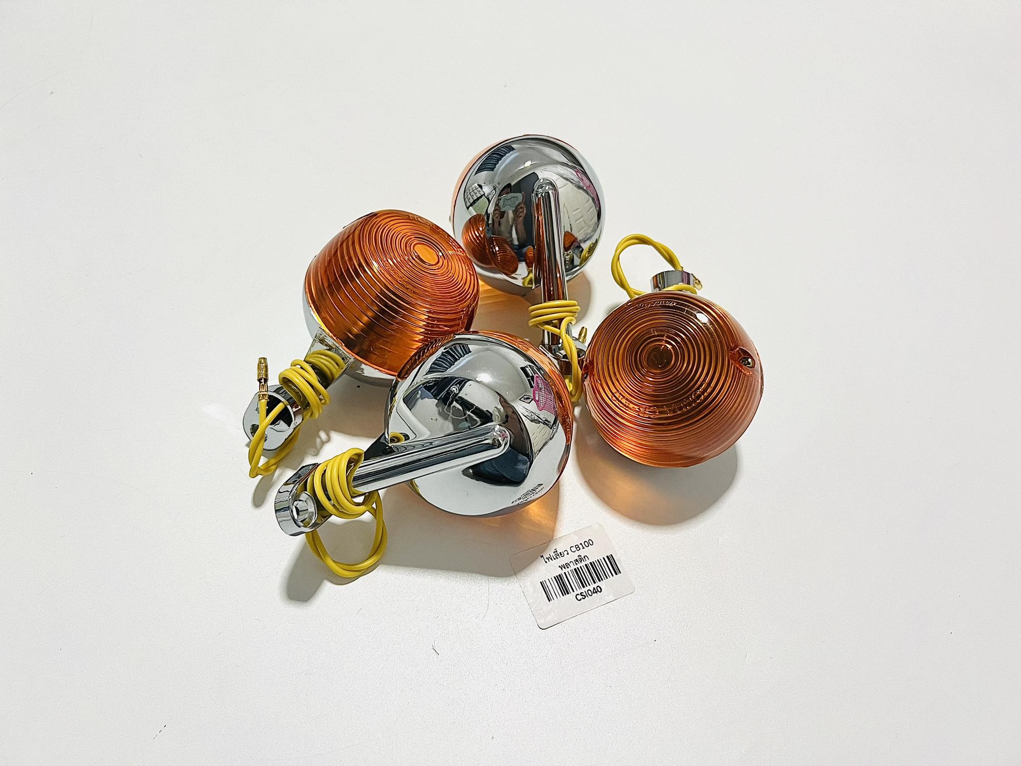 ไฟเลี้ยว ชาลี cb100 พลาสติกชุบ 4 ดวง ฝาส้ม ดวงละ 105 บาท บ14