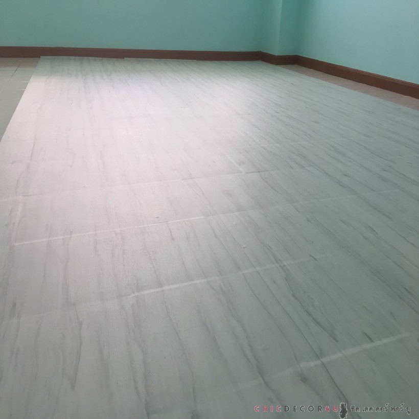 พีวีซีปูพื้น ลายไม้ สีขาว JP-001 หน้ากว้าง 100 ซม หนา 0.6 มม ยาวเมตรละ