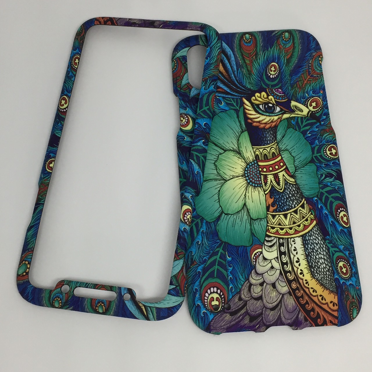 เคสคูทิส (Kutis) ไอโฟนX,XS(ลายนกยูง)