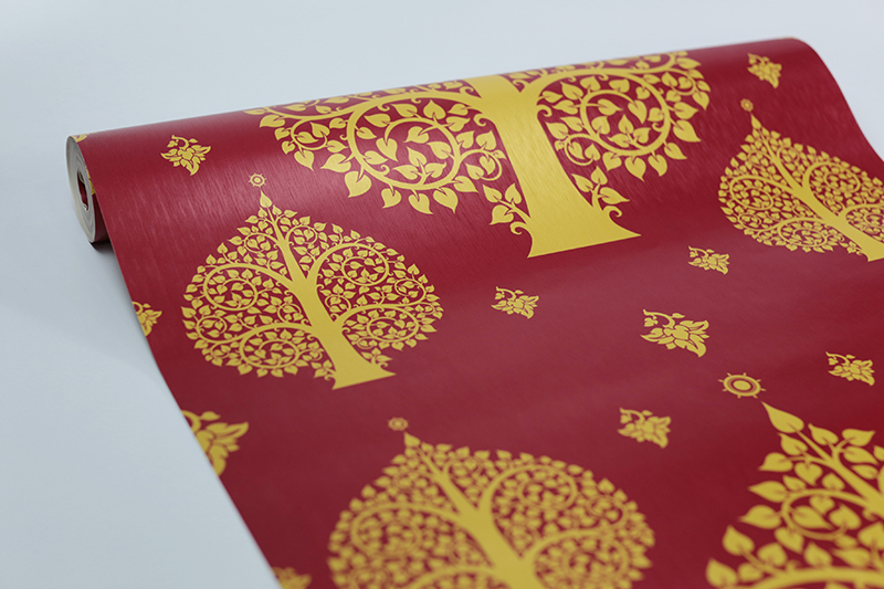 ลายต้นโพธิ์ สีเหลืองทอง พื้นหลังสีแดง