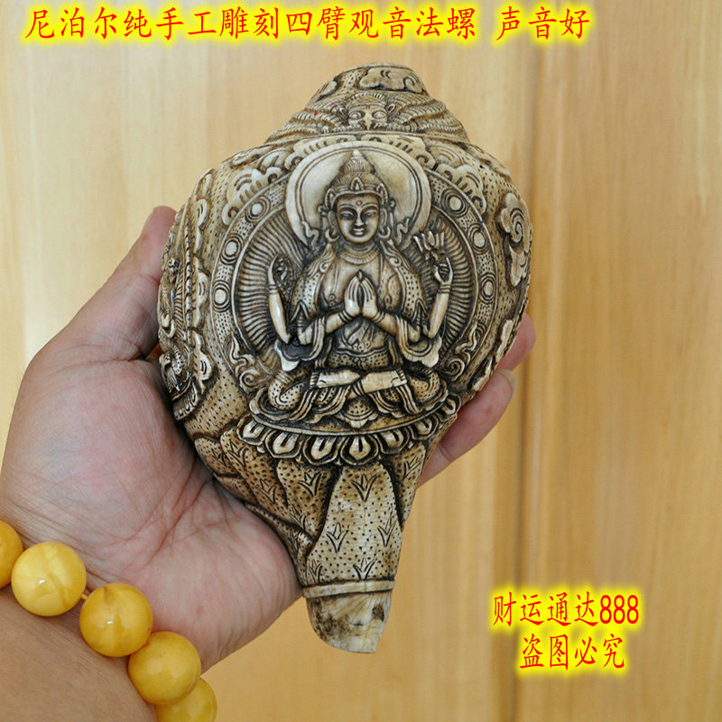 หอยสังข์อินเดียสีขาวแกะลายโดยช่างฝีมือเนปาล สำหรับใช้เป่าในพิธีกรรมทางศาสนา ขนาด 18 cm.