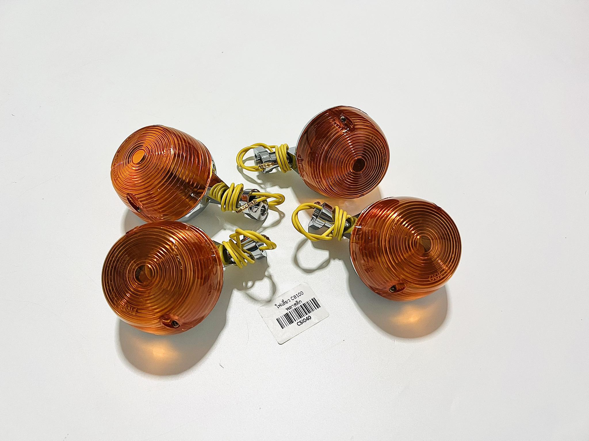 ไฟเลี้ยว ชาลี cb100 พลาสติกชุบ 4 ดวง ฝาส้ม ดวงละ 105 บาท บ14