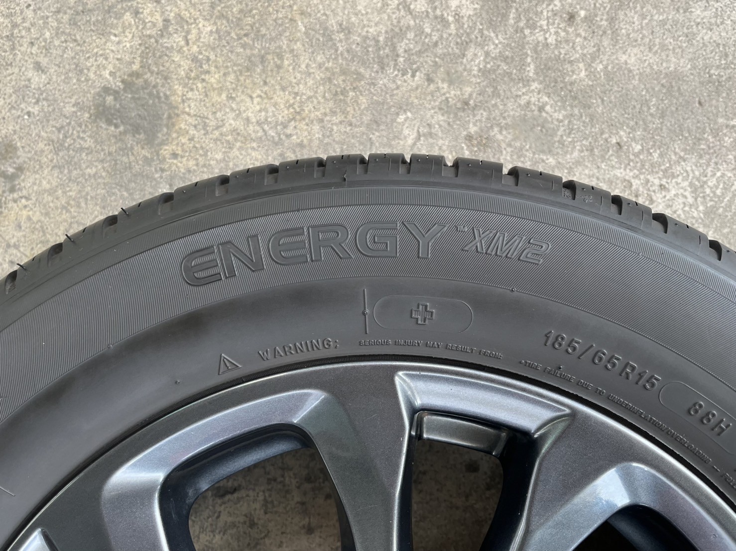 ✨ล้อแม็ก✨Mazda 2 Skyactiv ขอบ 15 สีเทาดำ พร้อมยาง 185-65-15 Michelin🌟ปี 23🌟