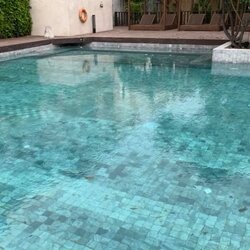 หินปูสระว่ายน้ำ Crystal black sanded โครงการ Palayana Hua Hin Cha-am