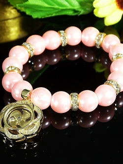 สร้อยข้อมือลูกปัดมุกห้อยจี้กังหันเรียกทรัพย์ แก้ปีชง เสริมชะตา