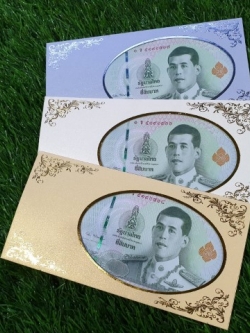 ของชำร่วยงานศพ ซองใส่แบงค์เจาะรูวงรี มีพลาสติกปิด