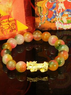 ข้อมือปี่เซี๊ยะเรียกทรัพย์ หินมงคลหยกฮกลกซิ่ว ขนาดหิน 10 มิล