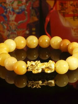 ข้อมือปี่เซี๊ยะเรียกทรัพย์ หินมงคลหยกน้ำผึ้ง ขนาดหิน 10 มิล